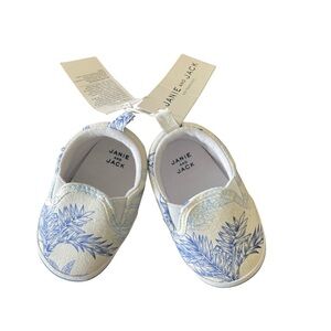 Janie and Jack blue botanical print on a white canvas slip-on shoe